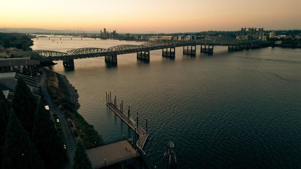 Drone footage of Oregon - Washington Interstate Bridge In Portland and Vancouver over the Columbia River water way. High quality 4k footage