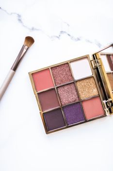 Cosmetic branding, fashion blog and glamour set concept - Eye shadow palette swatches on marble background, make-up and eyeshadows cosmetics product for luxury beauty brand and holiday flatlay design