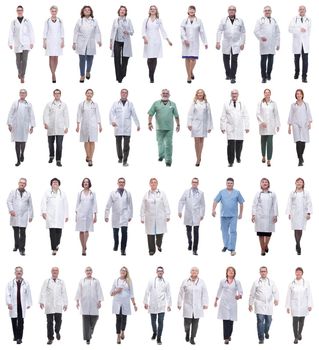 group of doctors in motion isolated on white background