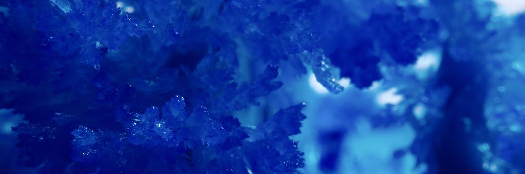 Closeup of blue shiny crystal abstract background. Beautiful nature concept