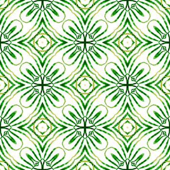 Summer exotic seamless border. Green quaint boho chic summer design. Textile ready terrific print, swimwear fabric, wallpaper, wrapping. Exotic seamless pattern.