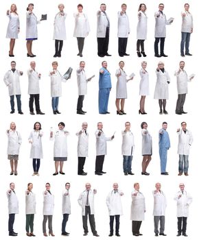 group of doctors in full length isolated on white background