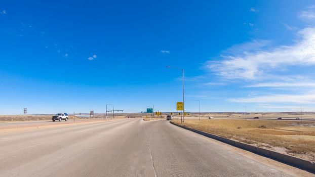 Driving on an interstate highway in suburban America.