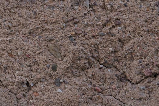 Bright dark red earth with stones. Rock. Earth background from another planet