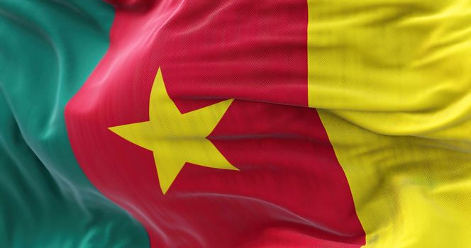 Close-up view of the Cameroon national flag waving in the wind. The Republic of Cameroon is a country in west-central Africa. Fabric textured background. Selective focus