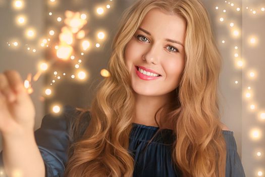 Holiday magic, Christmas and New Year celebration, happy woman with sparklers, portrait