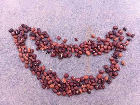 Smiley emoji made in cereals and grains. High quality photo