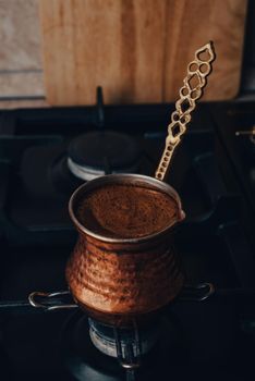Coffee Boiling In Copper Cezve on Stove