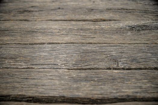 wood brown grain texture, dark wall background, top view of wooden table.