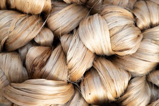 thick brown bundle of raw jute fiber Texture Background