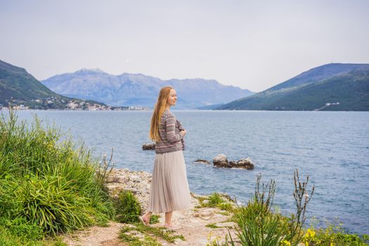 Woman tourist in Herceg Novi old town. Historical and touristic center of Herceg Novi. Montenegro.