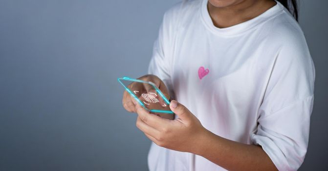 People's fingers are pressing on the phone screen fingerprint scanner. Represents protection against external hacks, code protection security concepts, viruses, firmware and malware.