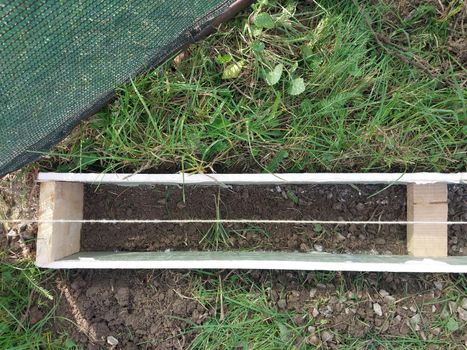 Construction of a strip foundation for a the fence