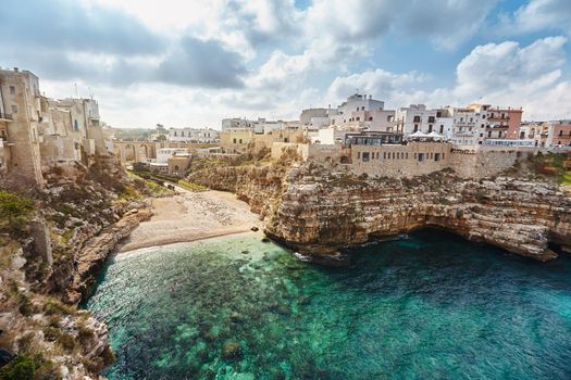 Heart-stopping sea landscape of Polignano a Mare, town in the province of Bari, Puglia, southern Italy on the Adriatic Sea. City on cliffs, heaven on the earth.