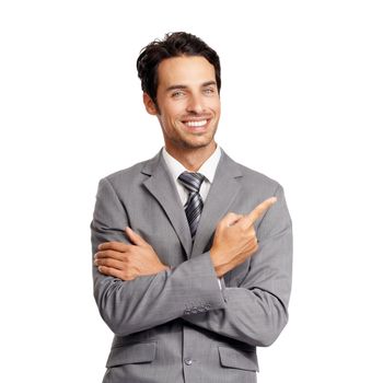 Its got his approval. A smiling young executive pointing at copyspace while isolated on a white background