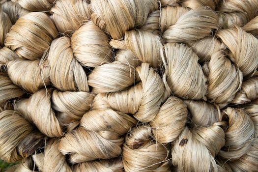 thick brown bundle of raw jute fiber Texture Background