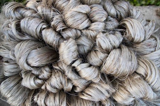 thick brown bundle of raw jute fiber Texture Background