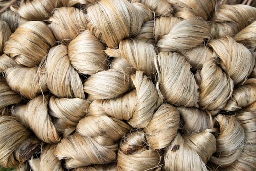 thick brown bundle of raw jute fiber Texture Background