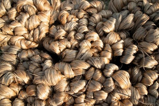 thick brown bundle of raw jute fiber Texture Background