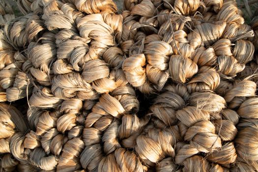 thick brown bundle of raw jute fiber Texture Background