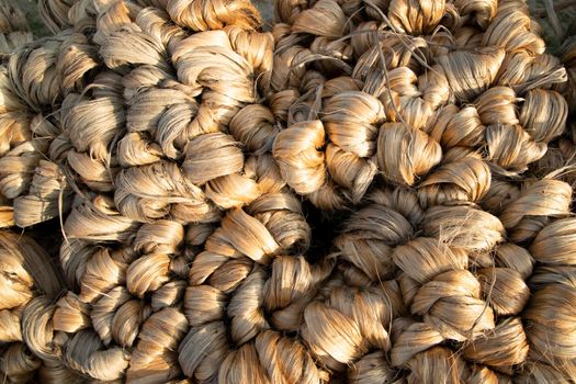 thick brown bundle of raw jute fiber Texture Background