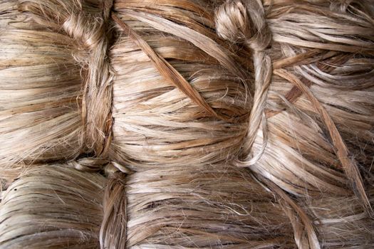 A thick bundle of Golden jute fiber Texture Background