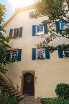 Traditional small house with beautiful outdoor decor facade in Germany. German old brick building house ancient European city German architect.