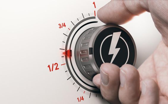 Man turning an electricity knob to reduce energy consumption. Energy efficient concept. Composite image between a 3d illustration and a photography.