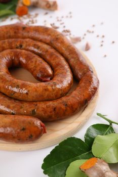 Local Northern Thai food , Northern Thai spicy sausage street food isolated in white background