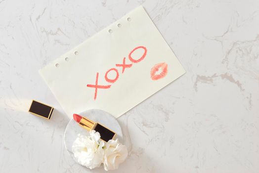 Mock-up background. Notebook with Marble Background. XOXO. Glamour style. Flat lay. Red lips.