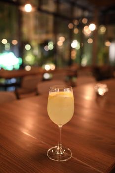 cocktails in glasses on bar counter in pup or restaurant