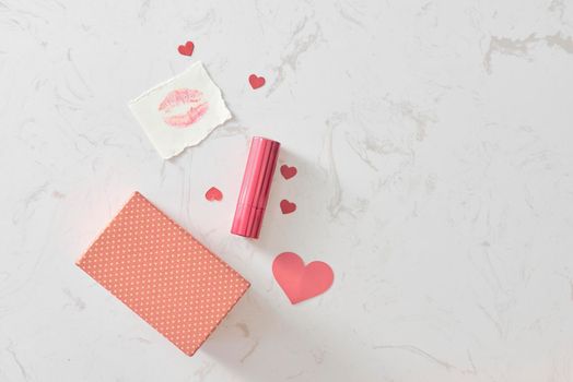 Happy Valentine's Day concept on vintage paper sheet with lipstick