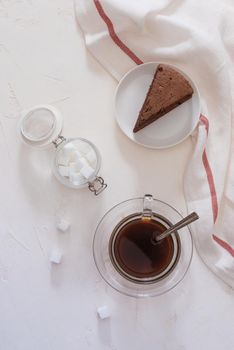 Drip coffee (dripper) and drip ground coffee with glass drip pot, cup and chocolate cake