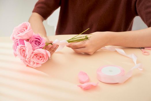 People making paper craft flower art 