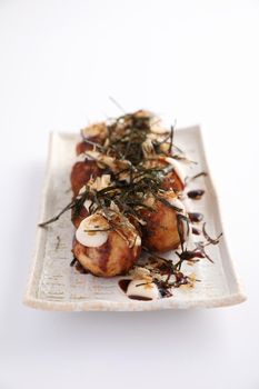 Takoyaki isolated in white background Japanese food
