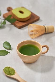 Green matcha Baumkuchen Japanese roll cakes with matcha, selective focus