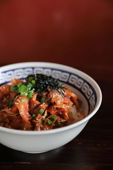 pork with kimchi on rice japanese food 