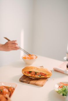 Vietnamese sandwich with meatballs. Traditional breakfast