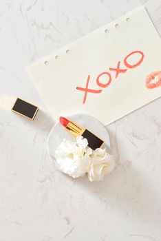 Mock-up background. Notebook with Marble Background. XOXO. Glamour style. Flat lay. Red lips.