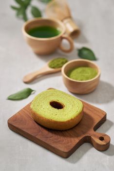 Green matcha Baumkuchen Japanese roll cakes with matcha, selective focus