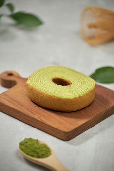 Green matcha Baumkuchen Japanese roll cakes with matcha, selective focus