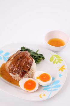 stewed pork leg with rice local Thai food street food isolated in white background