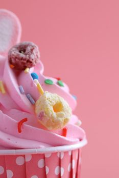 cupcake isolated in pink background