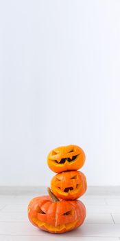 Halloween pumpkin head jack lantern with scary evil faces spooky holiday.