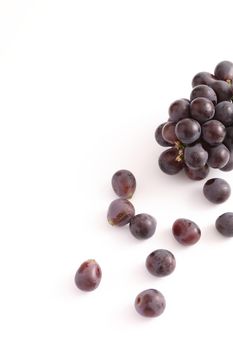 Red grapes isolated in white background