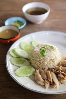 Thai food gourmet steamed chicken with rice on wood background 