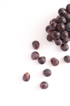 Red grapes isolated in white background