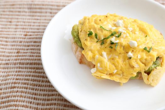 Avocado and scrambled eggs toast