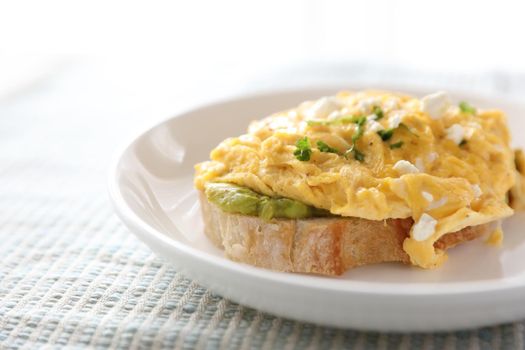 Avocado and scrambled eggs toast