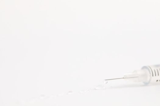 Syringe vaccine isolated in white background